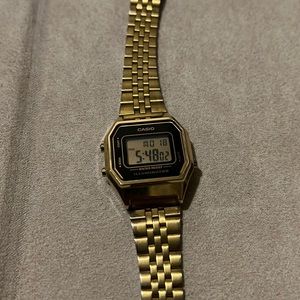 Casio gold tone mini digital “Illuminator” watch